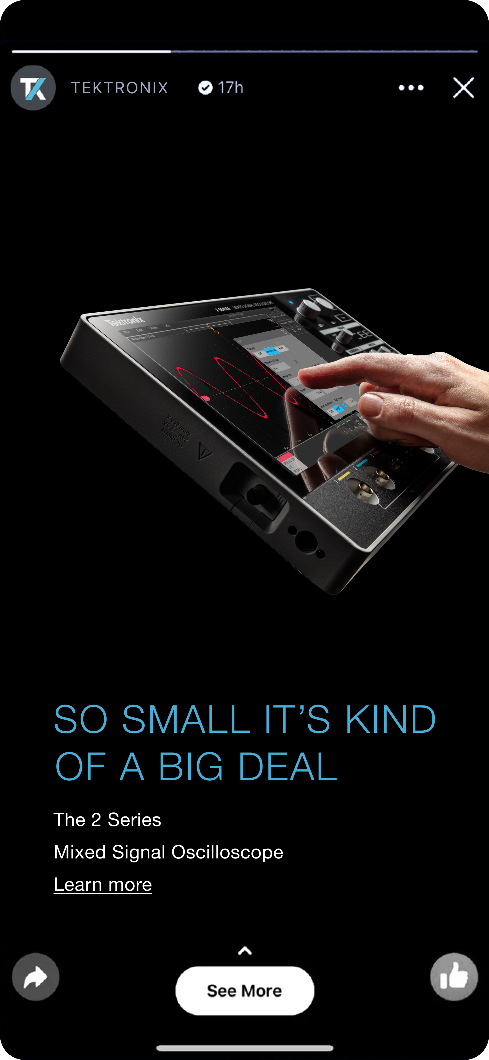 Image of the Tektronix 2 Series Mixed Signal Oscilloscope, showcasing a user interacting with the touchscreen interface, which displays waveform data. The device is compact and designed for portability, highlighting its advanced features and ease of use.
